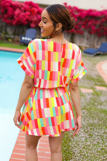 Eyes On You Coral Geo Abstract Surplice Woven Romper
