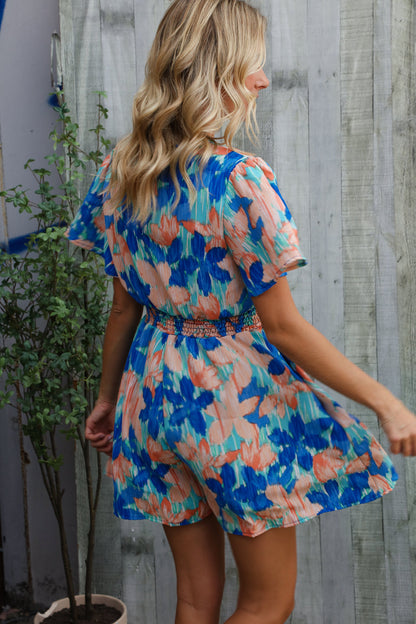 Feeling Bold Turquoise Floral Smocked Waist Flutter Sleeve Romper
